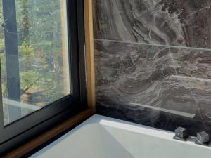 Ένα μπάνιο στο 苗場サンバレーホテル