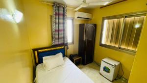 Postel nebo postele na pokoji v ubytování Hotel Ali Sabieh