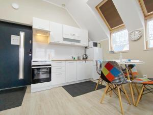 Kuchyň nebo kuchyňský kout v ubytování Morska Przystań e-apart pl + 9 fotografií