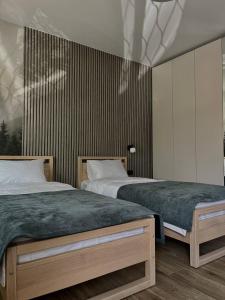 Ένα ή περισσότερα κρεβάτια σε δωμάτιο στο Апарт-готель "Модерн 24"