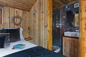 Voodi või voodid majutusasutuse Pedney toas