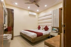 Postel nebo postele na pokoji v ubytování Hotel Star Palace + 25 fotografií