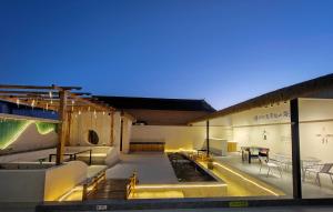 Swimmingpoolen hos eller tæt på Nanshan Ski Resort - Nanshan Muxue Homestay