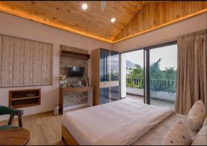 Ένα ή περισσότερα κρεβάτια σε δωμάτιο στο The Boho Stays Dharamshala