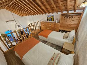 Postel nebo postele na pokoji v ubytování Paradise House Furnas