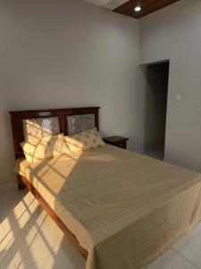 Ένα ή περισσότερα κρεβάτια σε δωμάτιο στο Marhaba Guest House