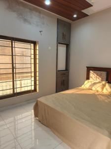 Ένα ή περισσότερα κρεβάτια σε δωμάτιο στο Marhaba Guest House