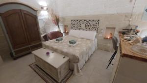 Postel nebo postele na pokoji v ubytování A Casa di Nonna Lina