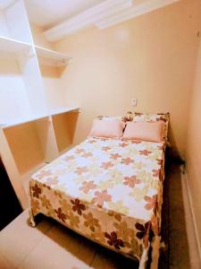 En eller flere senge i et værelse på Apartamento 2 quartos ótima localização em Belem