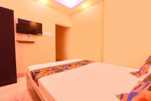 Postel nebo postele na pokoji v ubytování Via Sunset Park