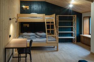 Ένα ή περισσότερα κρεβάτια σε δωμάτιο στο Bilyi Slon Gadzhyna