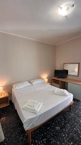 Postel nebo postele na pokoji v ubytování Route 21