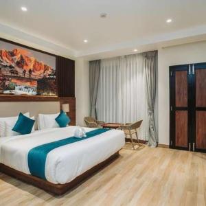 Ένα ή περισσότερα κρεβάτια σε δωμάτιο στο Hotel The Infinity Near Delhi Airport