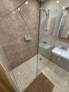 Koupelna v ubytování Daugavas Rezidence + 11 fotografií