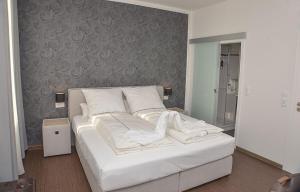 Postel nebo postele na pokoji v ubytování Vittoria Hotel-Restaurant