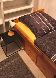 Voodi või voodid majutusasutuse MK-Zimmervermietung Neumünster Einfeld toas