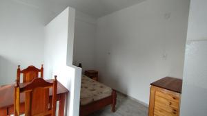 Postel nebo postele na pokoji v ubytování Las brotolas