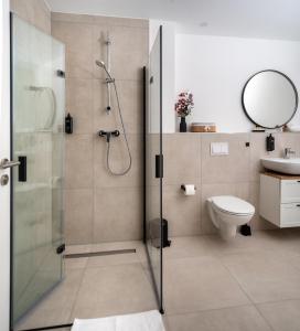 Koupelna v ubytování Cozy 9 + 29 fotografií