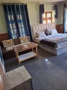 Posezení v ubytování Shashni Homestay, Phugtal