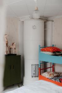 Postel nebo postele na pokoji v ubytování Kepuisten tila