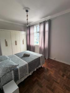 Ένα ή περισσότερα κρεβάτια σε δωμάτιο στο Apartamento na Graça com excelente localização