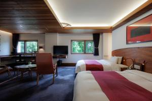 Postel nebo postele na pokoji v ubytování Hotel Chourakukan Kyoto Gion 長楽館 京都 + 134 fotografií