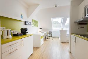 Kuchyň nebo kuchyňský kout v ubytování Candlewood Suites Fürth by IHG