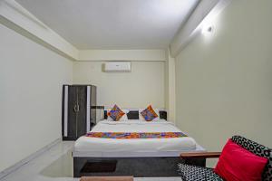 Ένα ή περισσότερα κρεβάτια σε δωμάτιο στο Hotel Naman