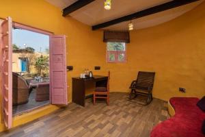 Istumisnurk majutusasutuses Arise Rustic Village Resort - Maneser