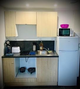 Kuchyň nebo kuchyňský kout v ubytování 302 Bron galerie lafayette