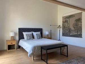 Postel nebo postele na pokoji v ubytování Duplex Le Hêtre