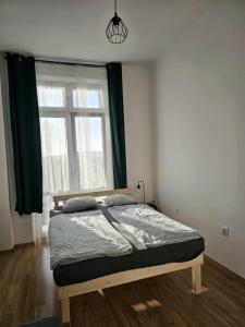 Ένα ή περισσότερα κρεβάτια σε δωμάτιο στο W1 PRIVATE rooms