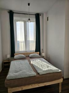 Ένα ή περισσότερα κρεβάτια σε δωμάτιο στο W1 PRIVATE rooms