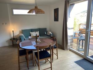 Posezení v ubytování Duplex Le Hêtre