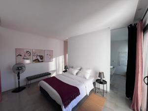 Postel nebo postele na pokoji v ubytování Dar El Musc