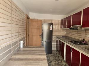 Η κουζίνα ή μικρή κουζίνα στο Appartement meublé