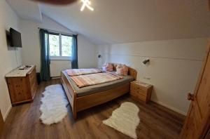 Ένα ή περισσότερα κρεβάτια σε δωμάτιο στο Apartment Auszeit bei Christl