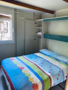 Postel nebo postele na pokoji v ubytování Bungalow Camping Aralar