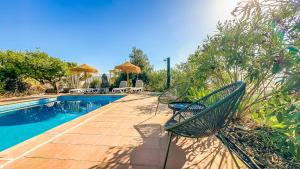 Bazén v ubytování Finca Estrelicia nebo v jeho okolí
