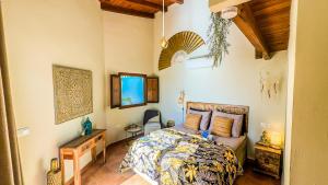 Postel nebo postele na pokoji v ubytování Finca Estrelicia + 42 fotografií