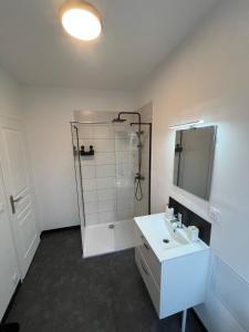 a white bathroom with a shower and a sink at Maison Arques-la-Bataille à 5min de Dieppe in Arques-la-Bataille +19 photos