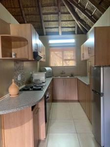 Køkken eller tekøkken på Lapa Phanzi