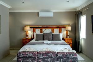 Ένα ή περισσότερα κρεβάτια σε δωμάτιο στο Louvre Guesthouse +68 φωτογραφίες