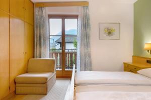 Ένα ή περισσότερα κρεβάτια σε δωμάτιο στο Unterdornerhof Algund +129 φωτογραφίες