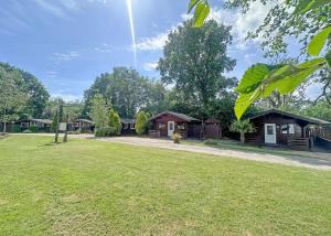 Κήπος έξω από το Heronstone Lodges +28 φωτογραφίες