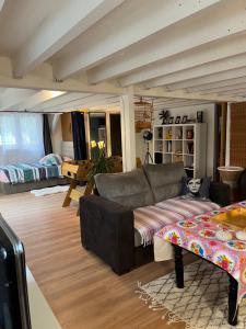 Posezení v ubytování Maison invitant aux voyages 20mn de la plage