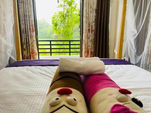 Postel nebo postele na pokoji v ubytování Moon View Home stay + 8 fotografií