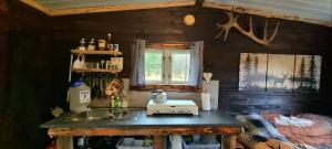 Ποτά στο Hjortebu i naturskjønne omgivelser