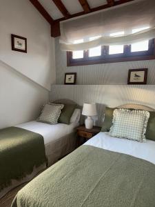 Postel nebo postele na pokoji v ubytování Casa ARRUIZ + 9 fotografií