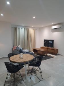 TV a/nebo společenská místnost v ubytování Nid de Tanamalaza